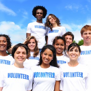 happy multi-ethnic volunteer group